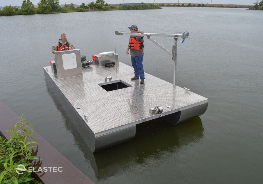 Platform workboat with davit